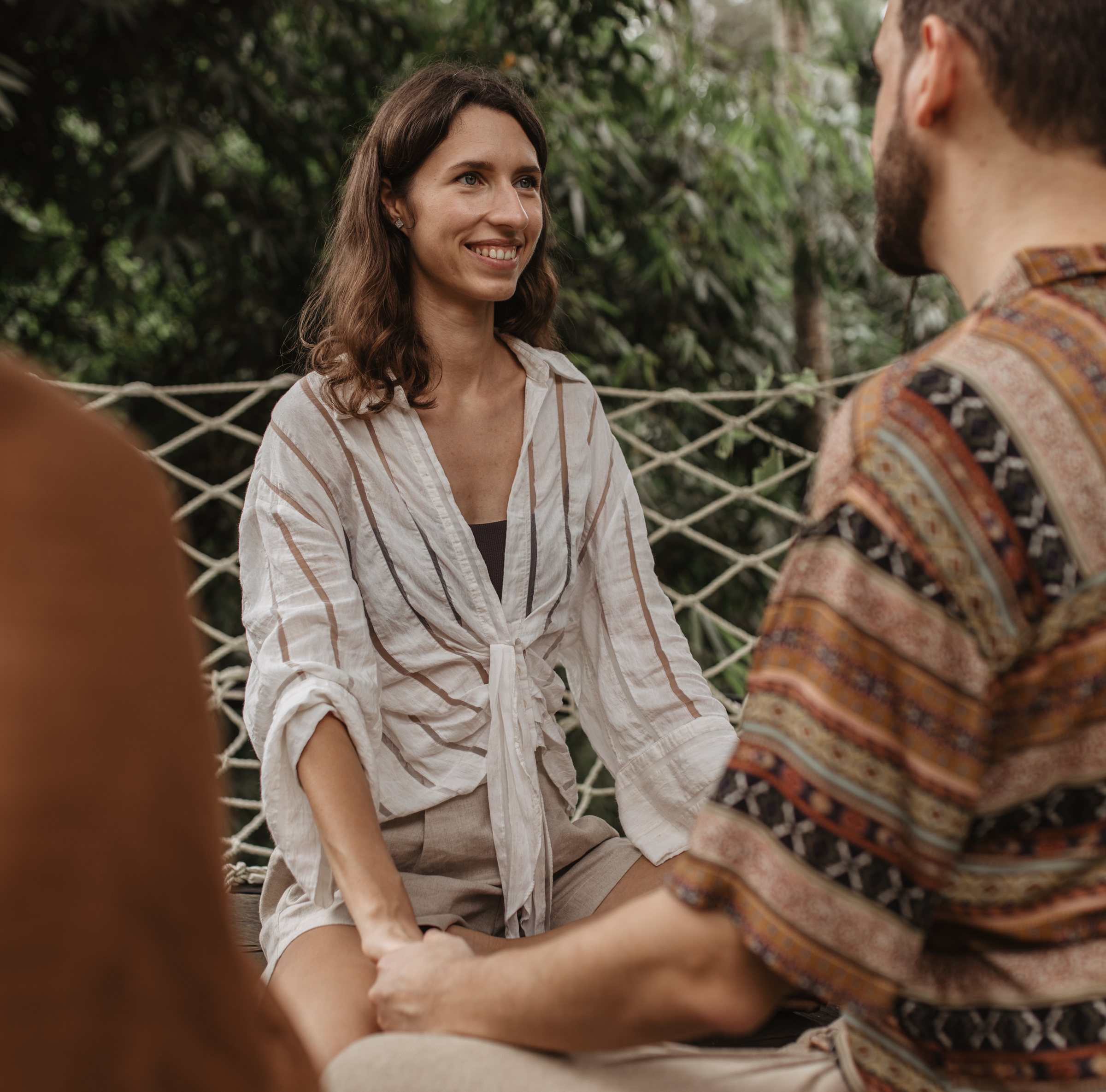 Two participants sharing a quiet moment outdoors