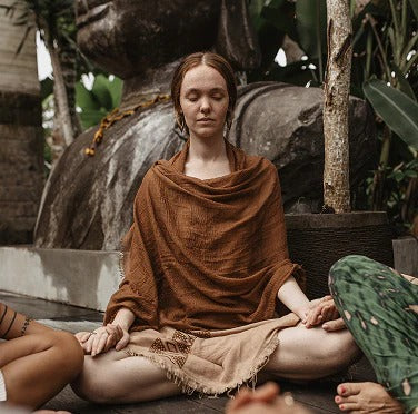Meditation and embodiment practice forming part of holistic practitioner certification focused on presence and regulation.