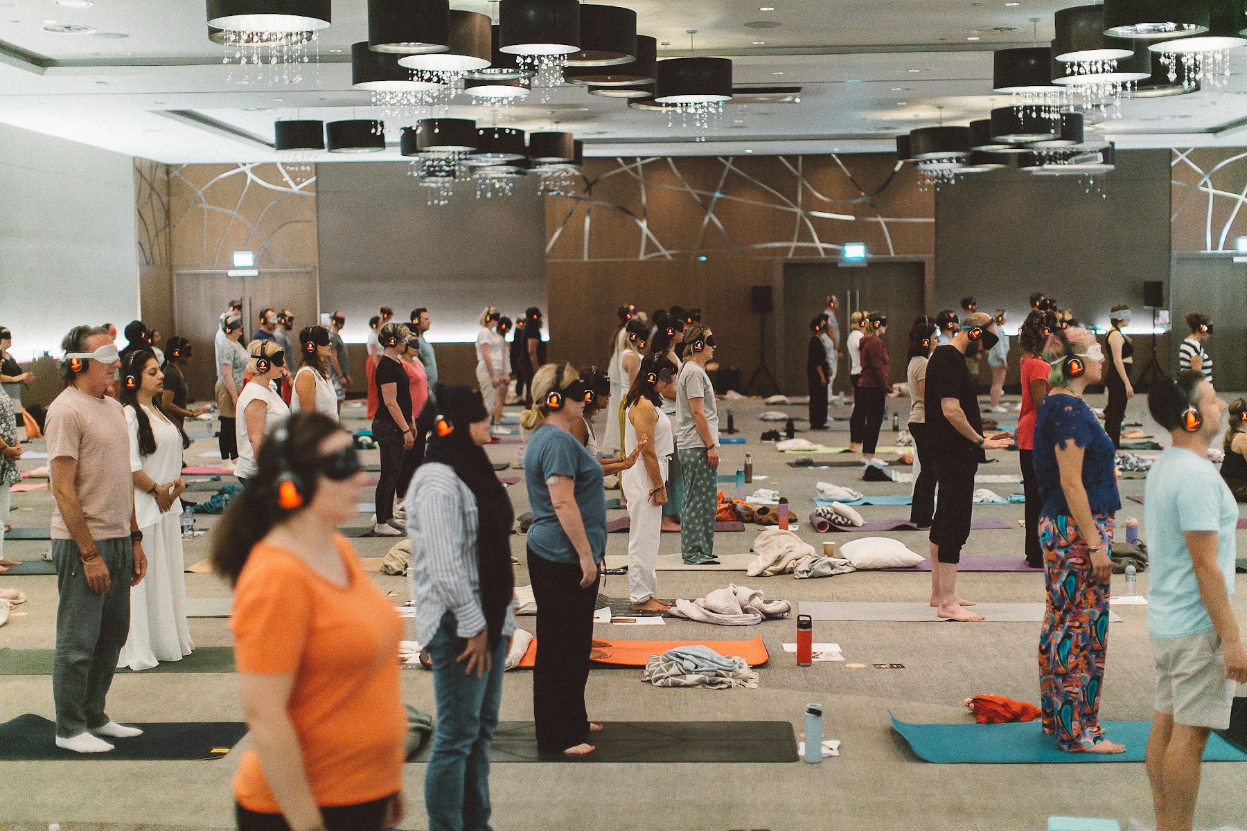A full ballroom in shared practice — from a previous InnerCamp retreat